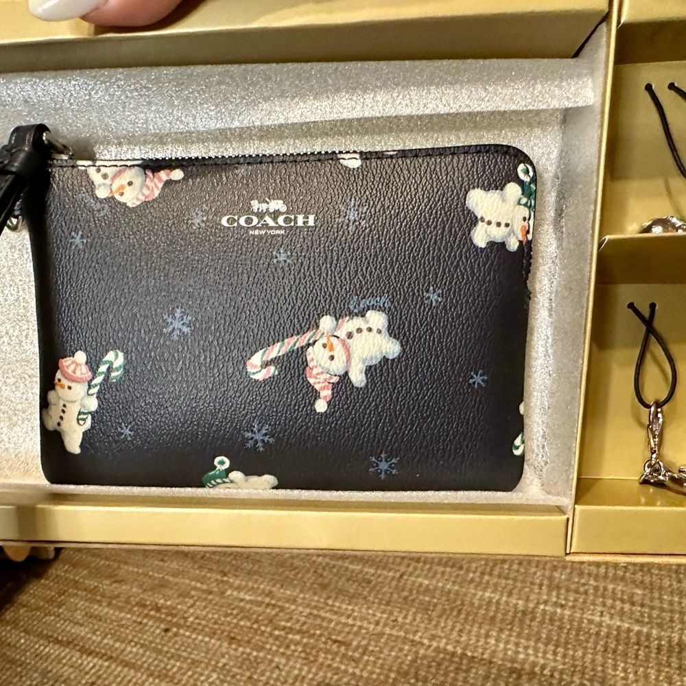 Coach Wristlet with Charms